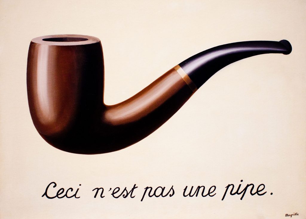 Magritte's The Treachery of Images (This is Not a Pipe) is a fitting visual analog for how I view writing and language and the world... Image credit: CC BY-NC 2.0 by Thomas Hawk
